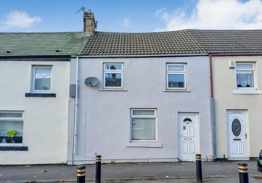 A Three Bedroom Mid Terrace House Subject to an Assured Shorthold Tenancy Producing £6,300 Per Annum