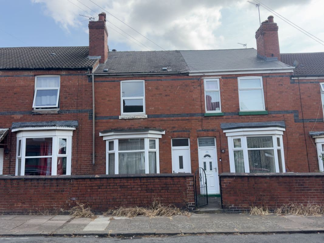 A Vacant Freehold Mid Terraced Property