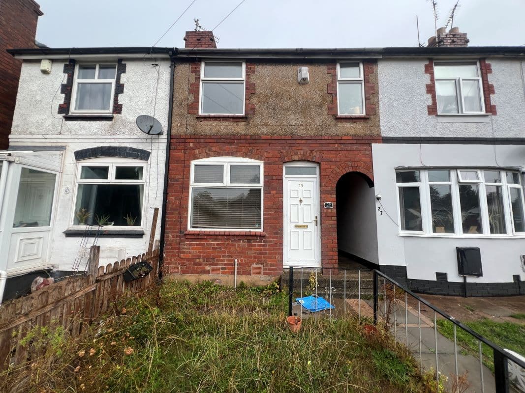 Vacant Freehold Mid Terraced Property