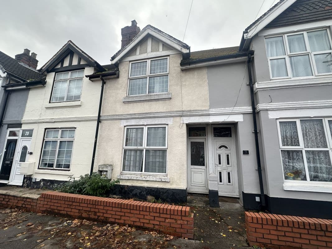 Vacant Freehold Mid Terraced Property