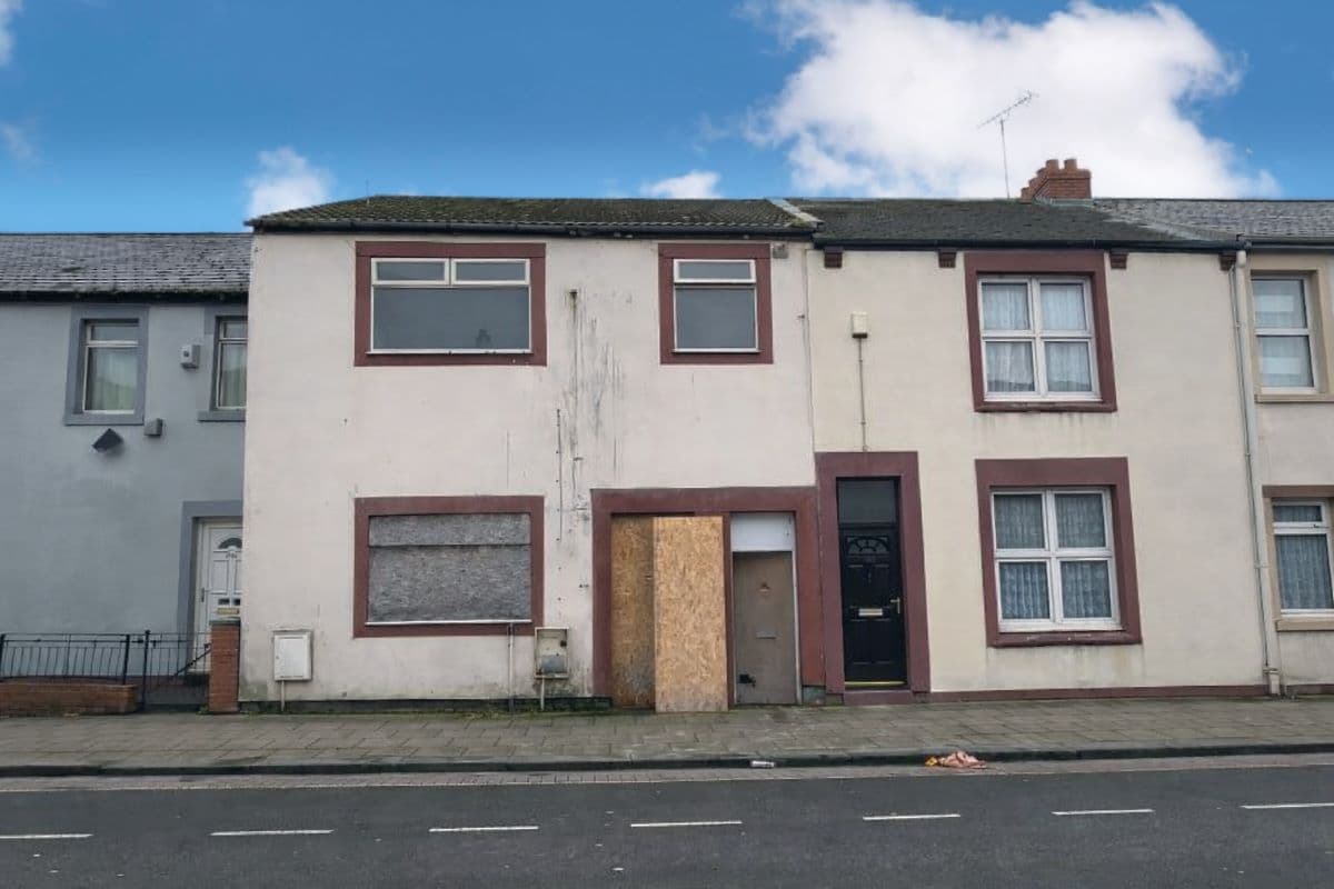Vacant Freehold Mid Terraced Property Converted into Flats