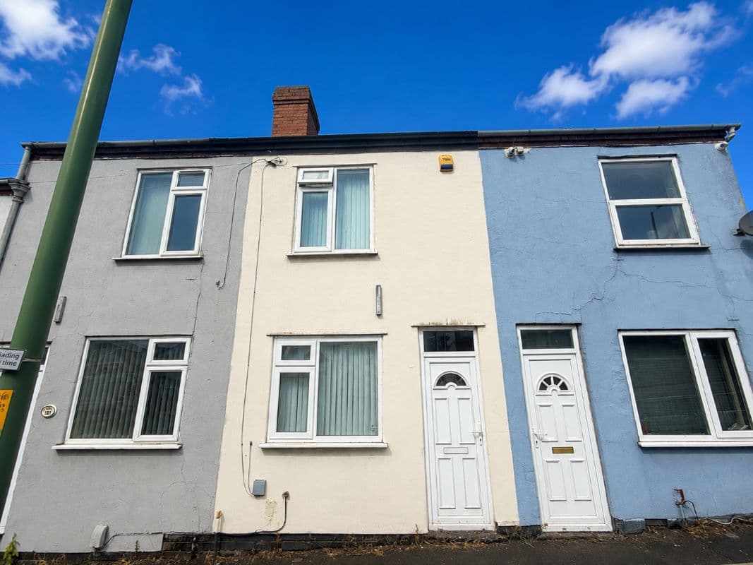 Vacant Freehold Mid Terraced Property