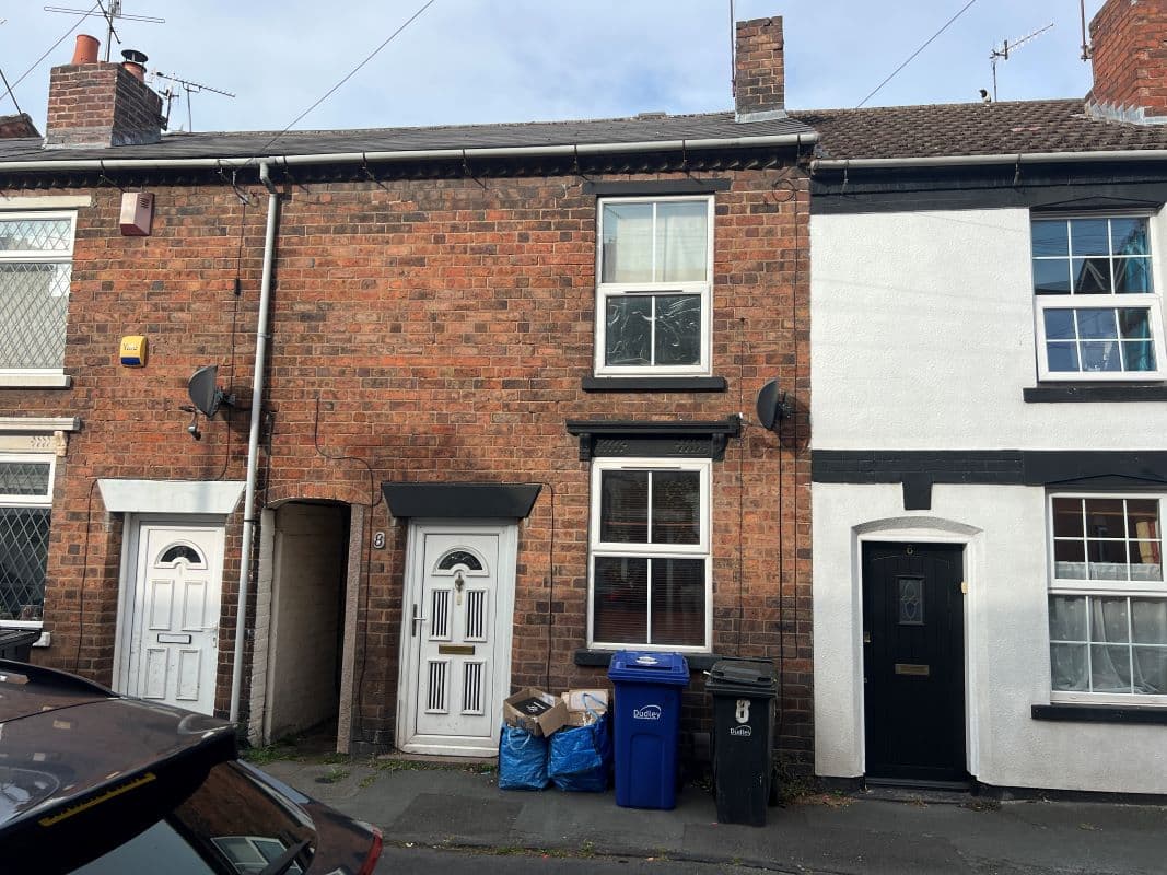 A Vacant Freehold Mid Terraced Property