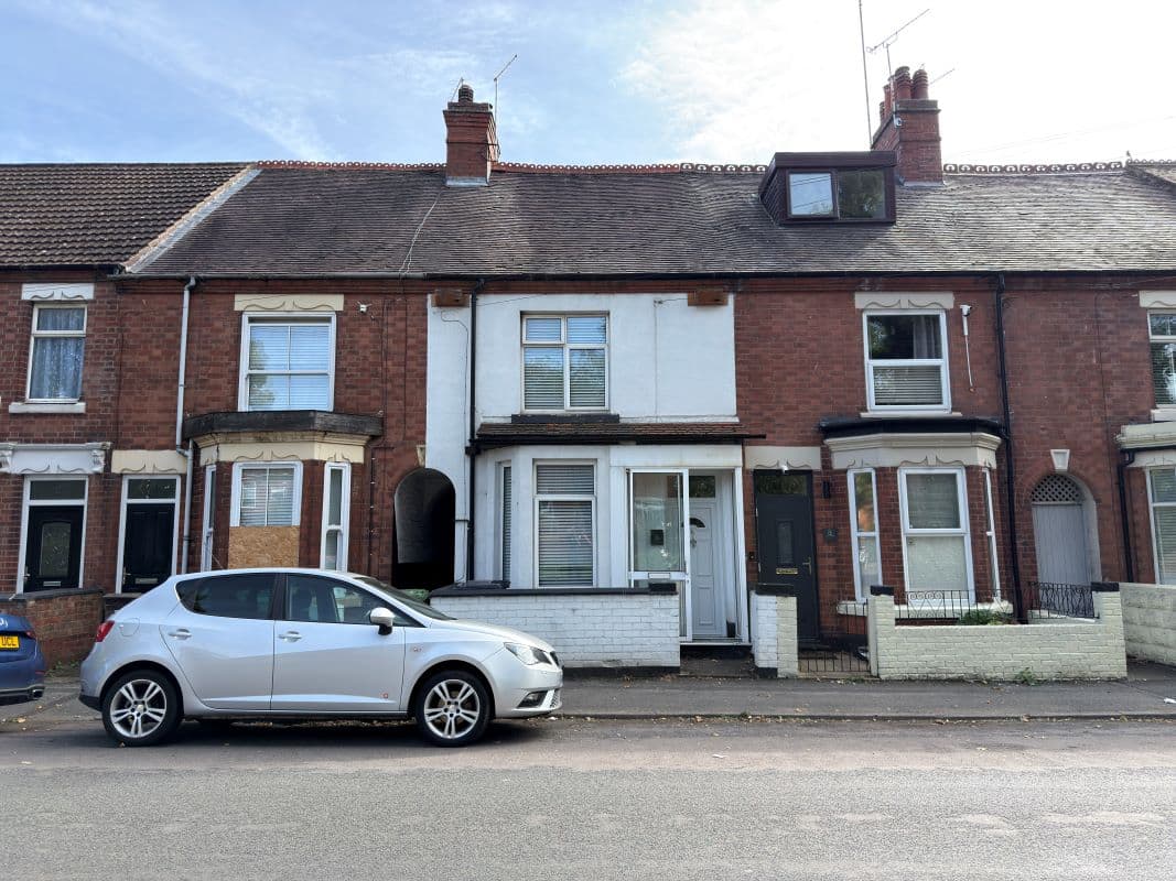 Vacant Freehold Mid Terraced Property