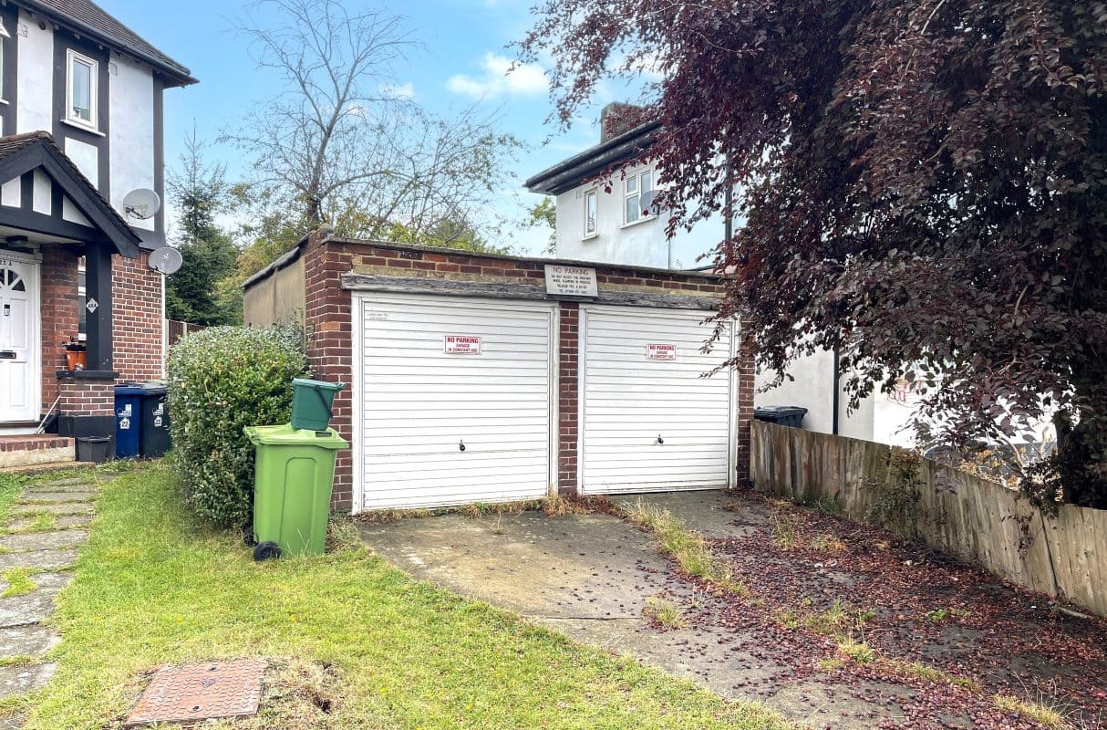 Two Freehold Garages Vacant Possession
