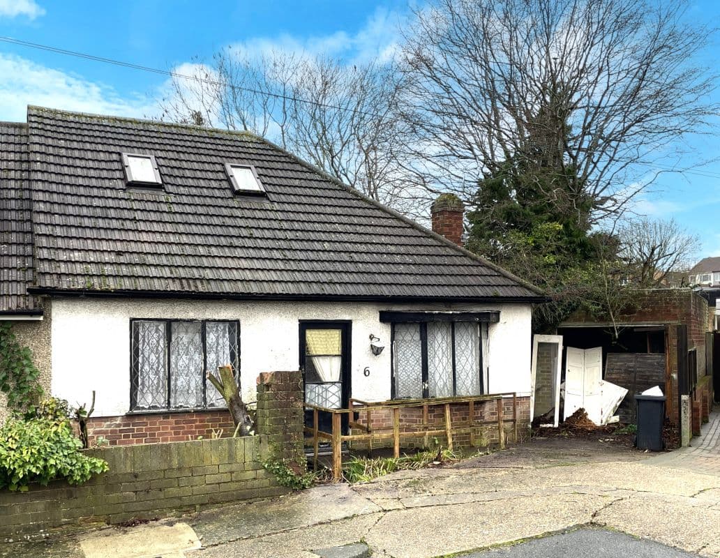Freehold Bungalow and Detached Garage Vacant Possession