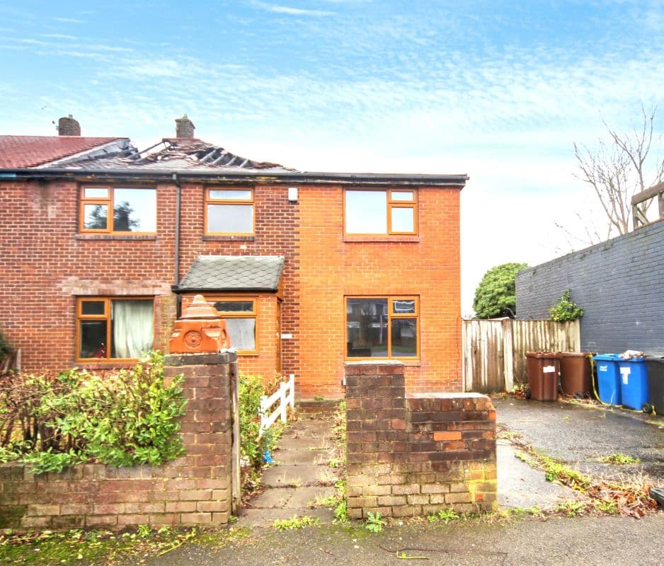 Fire Damaged Double Fronted End of Terrace House