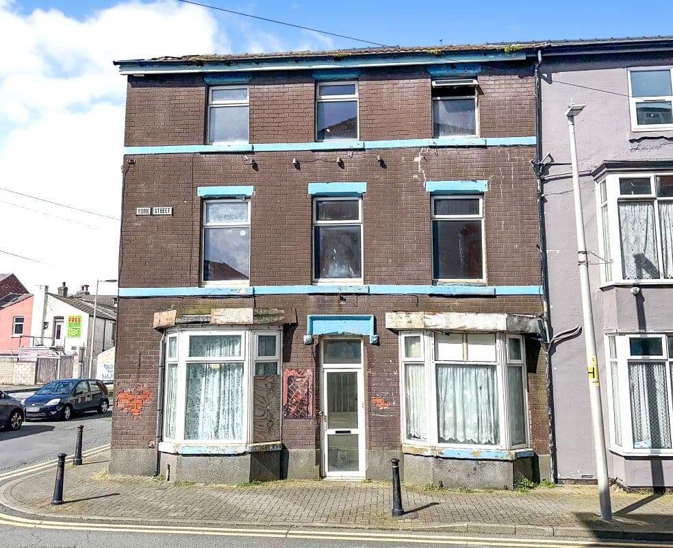 Freehold Double Fronted End of Terrace Building Vacant Possession
