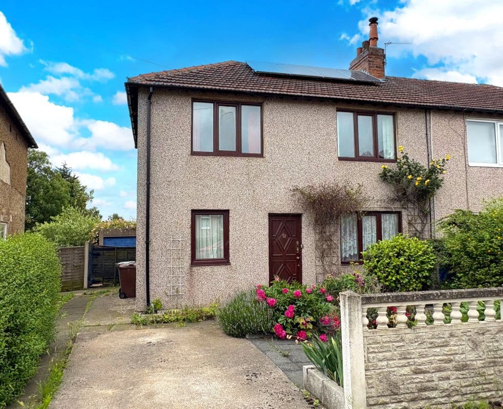Freehold Semi-Detached House and Detached Garage Vacant Possession