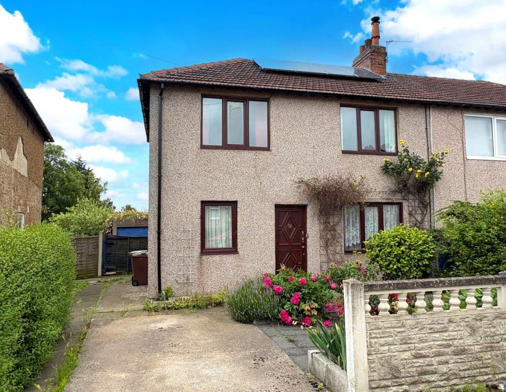 Freehold Semi-Detached House and Detached Garage Vacant Possession