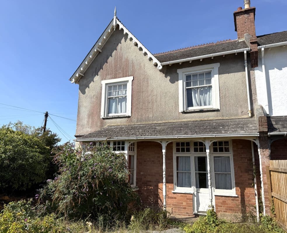 Freehold Semi-Detached House and Detached Garage Vacant Possession
