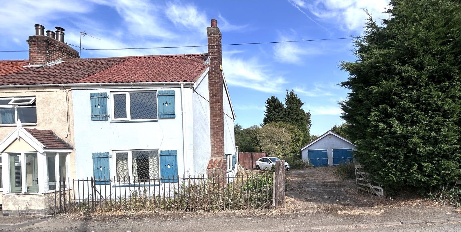 Freehold End of Terrace House and Detached Double Garage Vacant Possession