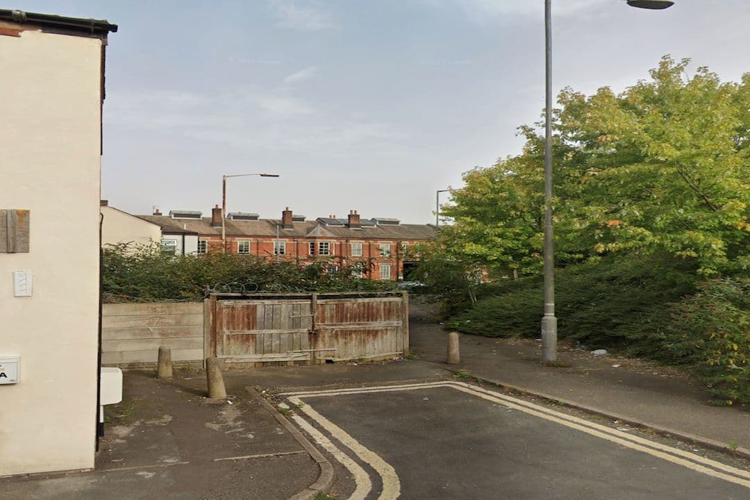 Approved development land for the erection of a two-storey building comprising two one-bedroomed self-contained residential units.