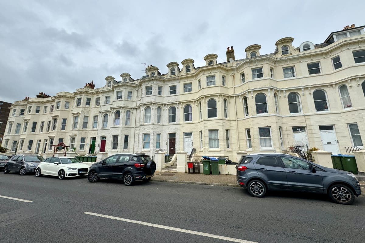 A vacant one-bedroom mid-floor flat with sea views
