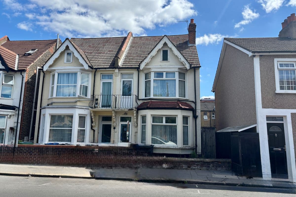 A vacant, four-bedroom, three-storey, semi-detached, freehold house in need of modernisation and repair