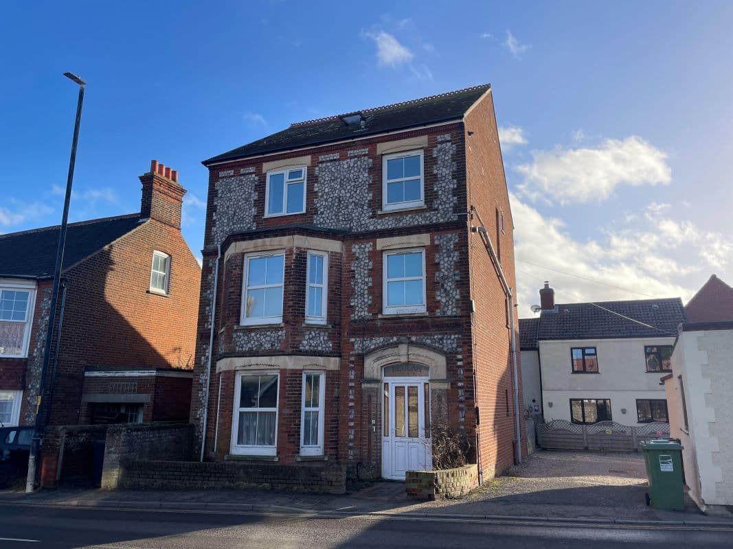Detached Flint and Brick Property Divided into Three Apartments