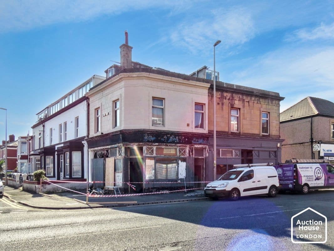 A Vacant Derelict Four Room Corner Building