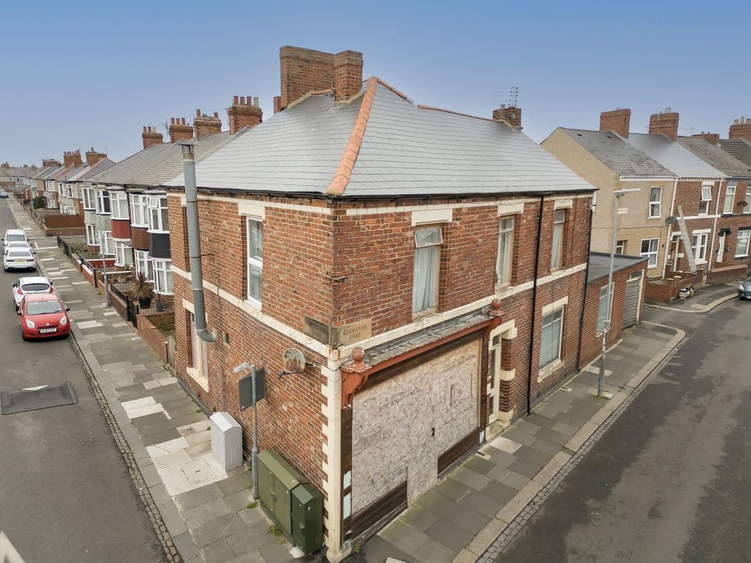 MIXED-USE PROPERTY WITH DEVELOPMENT POTENTIAL!