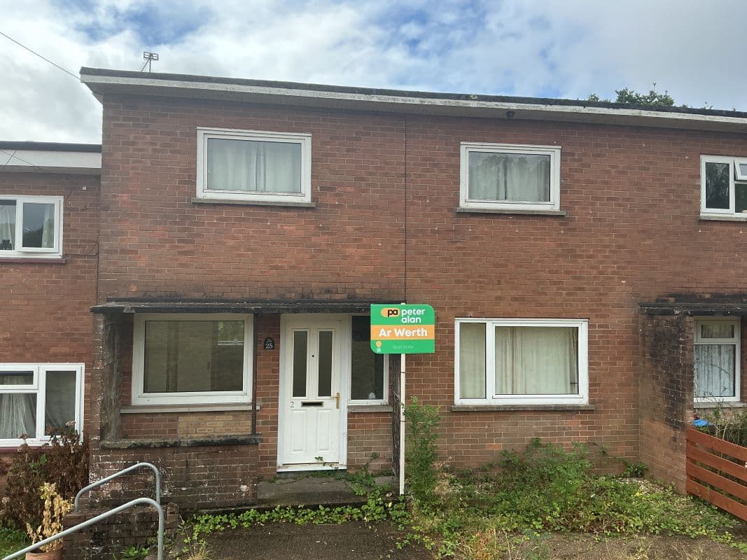 Mid Terraced Property In Need Of Refurbishment
