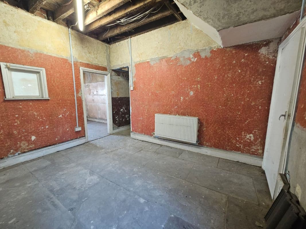 Three Bedroom Mid Terrace House