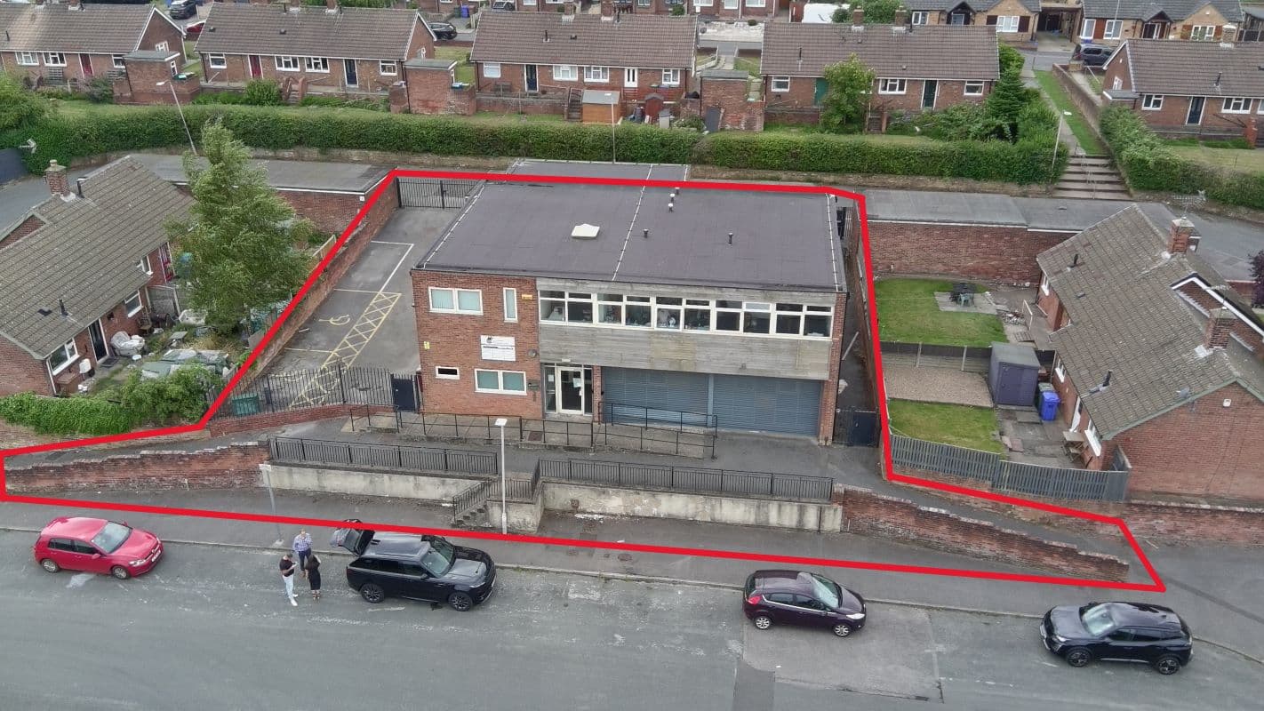 Flexible Commercial Investment or Redevelopment Opportunity in a Prime Residential Setting