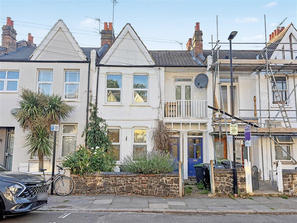 Freehold two storey building arranged as two self contained maisonettes