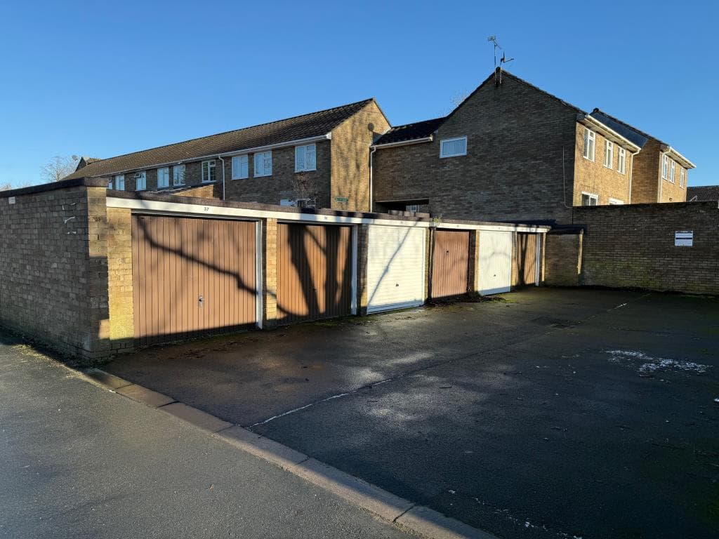 Lot 11 - Four Freehold Garages In A Larger Block