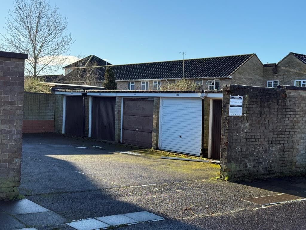 Lot 5 - Four Freehold Garages In A Larger Block
