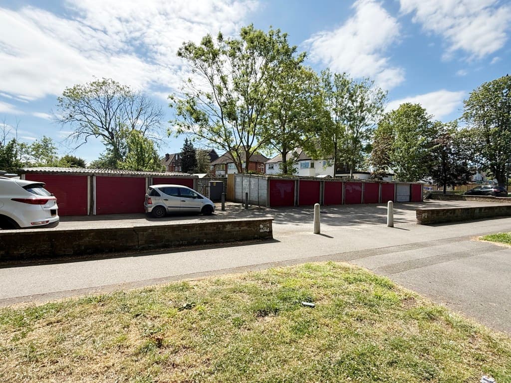 Eleven Garages And Land On Corner Site With Potential