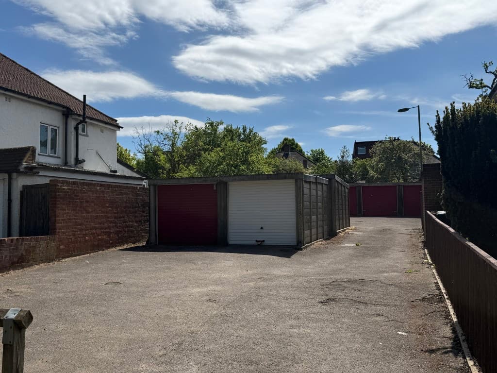 A Compound of Ten Garages With Potential