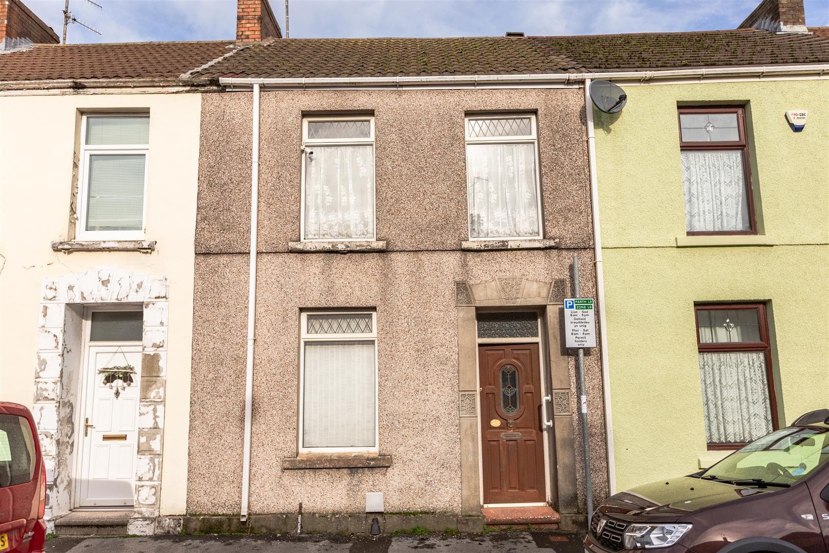 Three-Bedroom Mid-Terrace Property