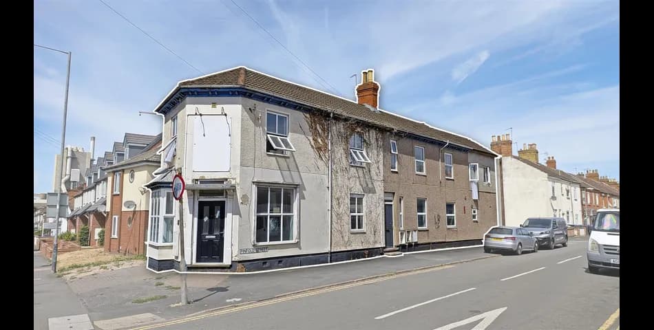 Two-Storey Mixed-Use Property with Three Flats and Retail Unit