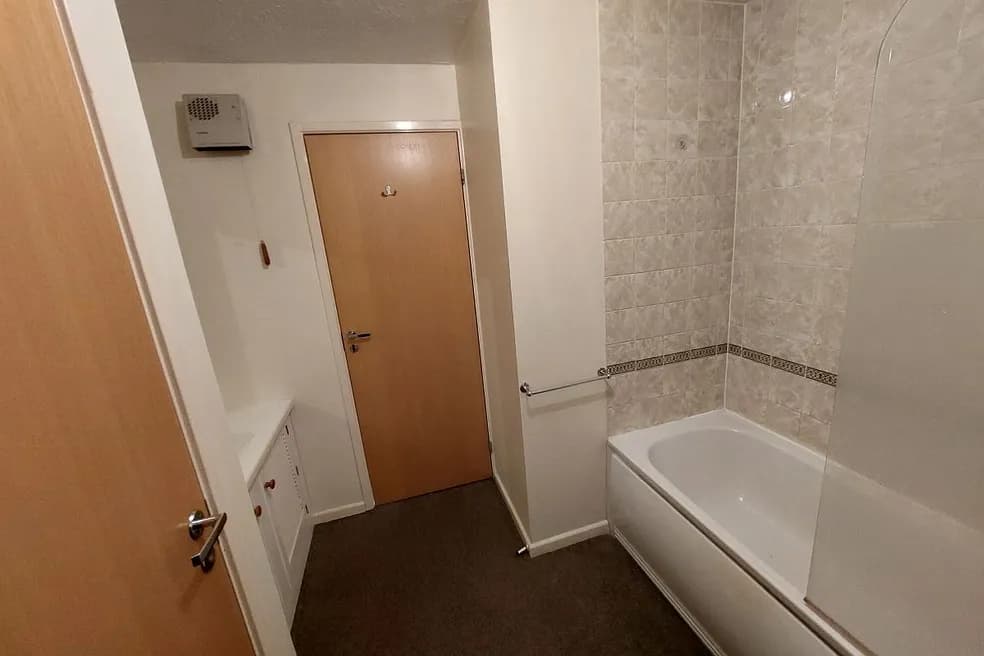 Vacant Long Leasehold Two Bedroom First Floor Flat with Parking Space