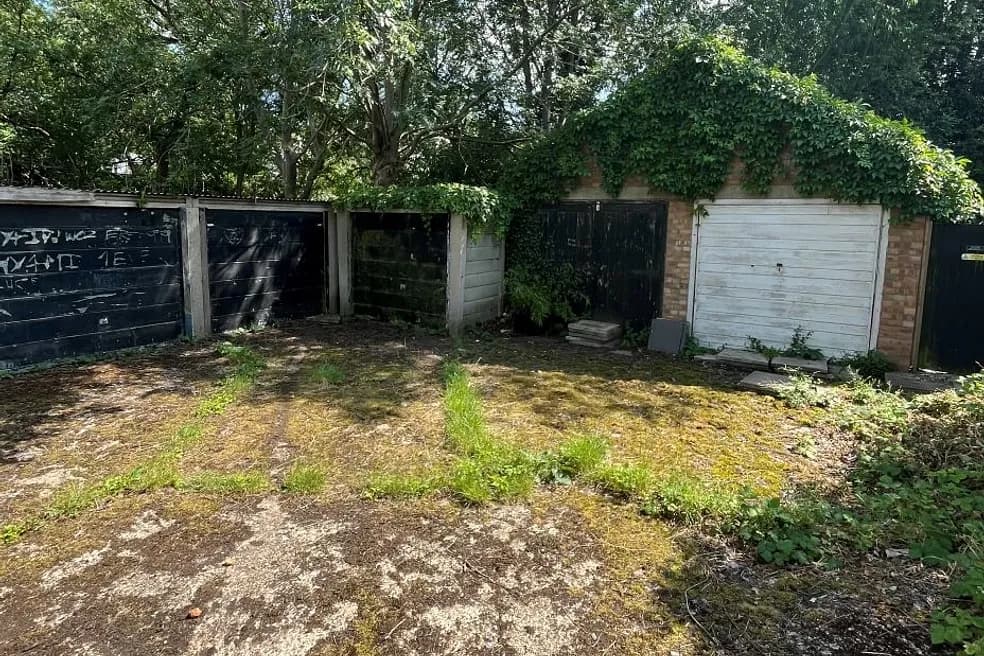 VACANT FREEHOLD LAND WITH SIX GARAGES