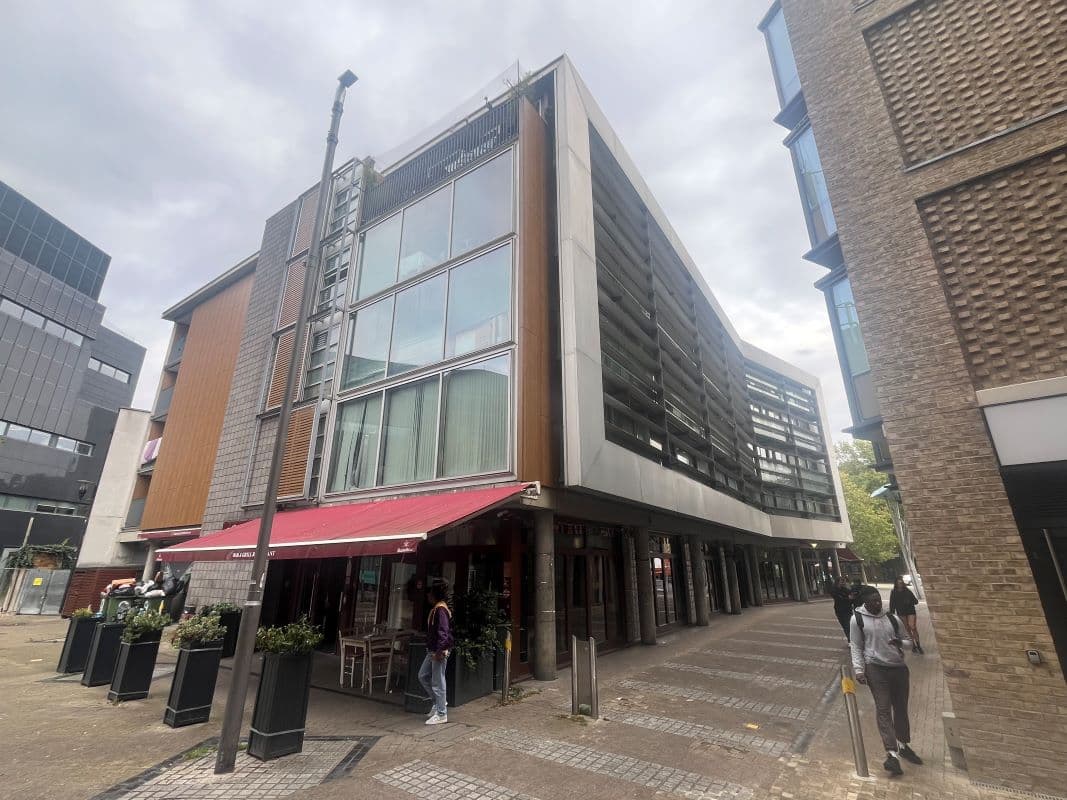 Freehold Restaurant with 27 Flats Above Producing Income