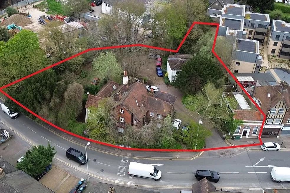 FREEHOLD SITE OF 0.56 ACRES WITH THREE VACANT OFFICE BUILDINGS