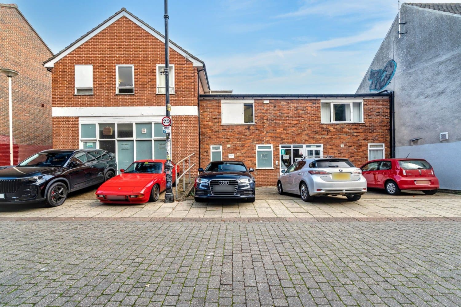Three Storey Terrace Building with Parking