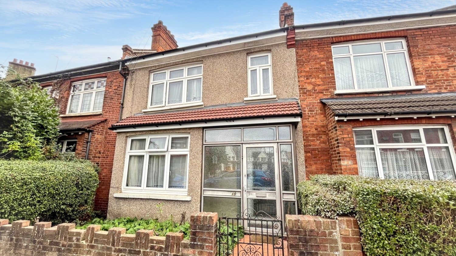 Four Bedroom Mid Terrace House