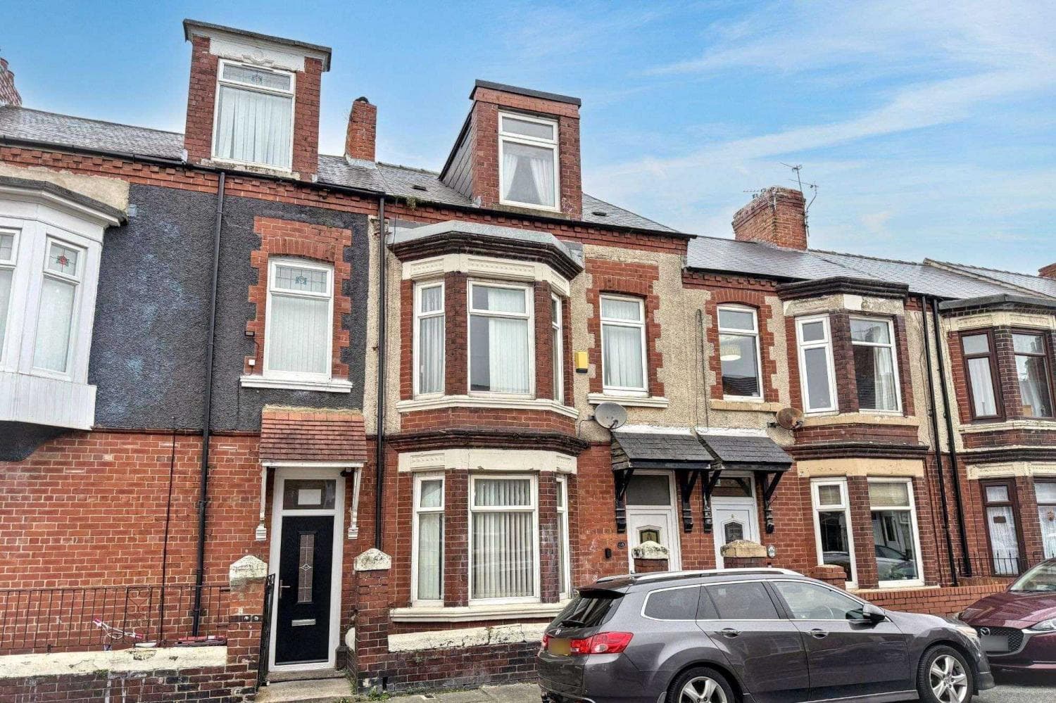 Four Bedroom Mid Terrace House