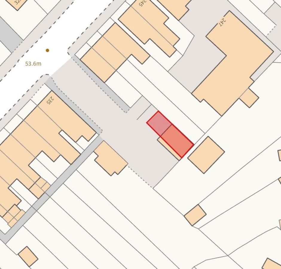Freehold Land with Domestic Garages