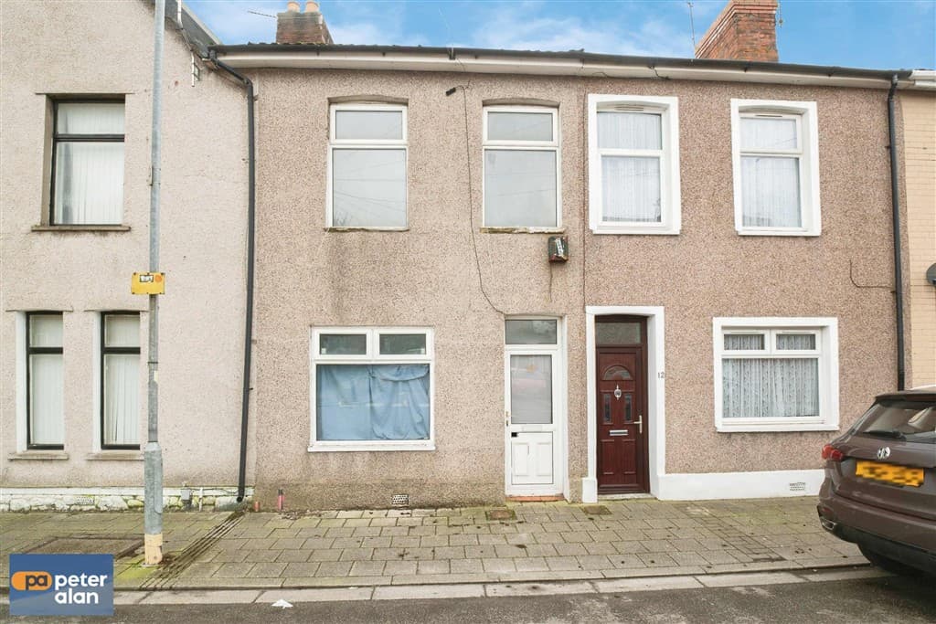 Three Bedroom Mid Terrace Property