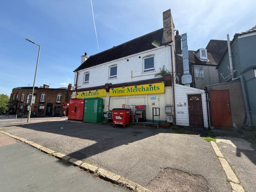 Freehold Building Arranged As Two Flats Above Commercial Premises Sold On Long Lease