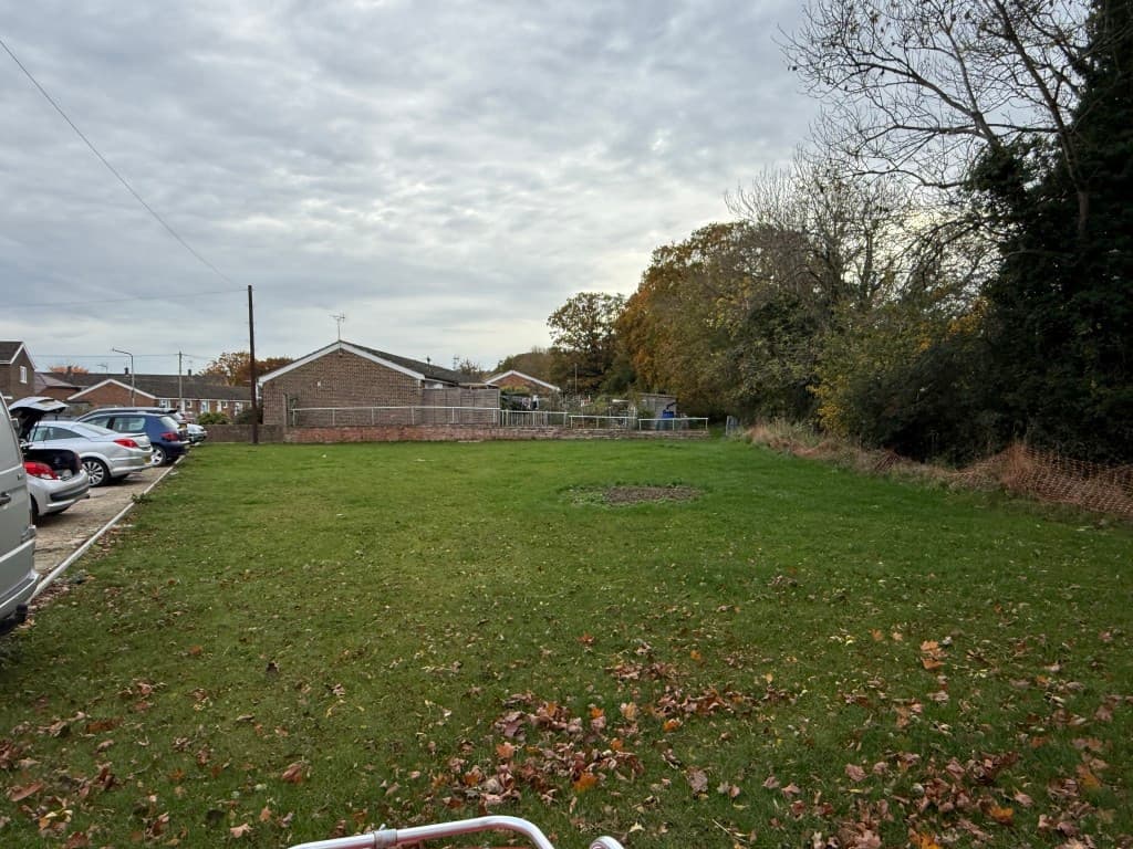 Land With Planning For Seven Affordable Homes Arranged As Six Flats And Detached Bungalow