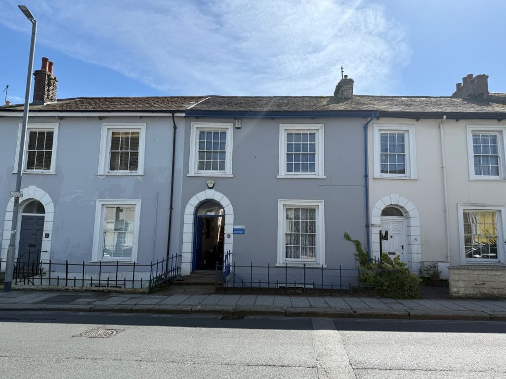 Commercial Property For Updating With Parking And Offering Potential